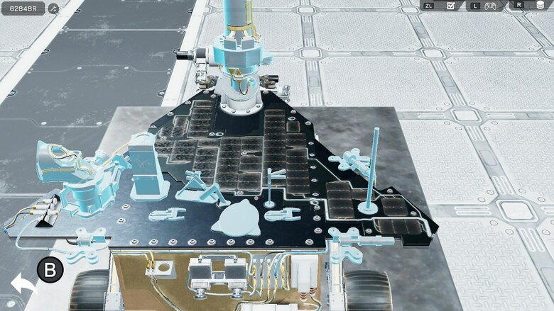 The blue highlighted parts have been removed, in order to gain access to the solar panel below.